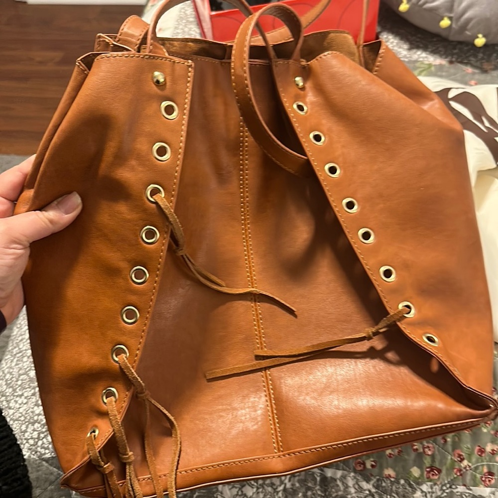 Inc brown bag. Barely used like new.